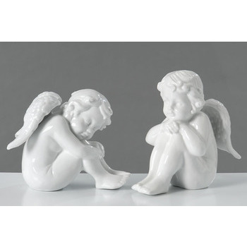 Ange assis, en porcelaine L.15 x 9 x H.16 cm